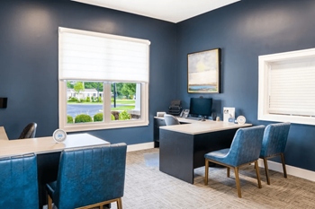 Office with blue chairs and a desk and a window at Waterstone Landing, Ohio